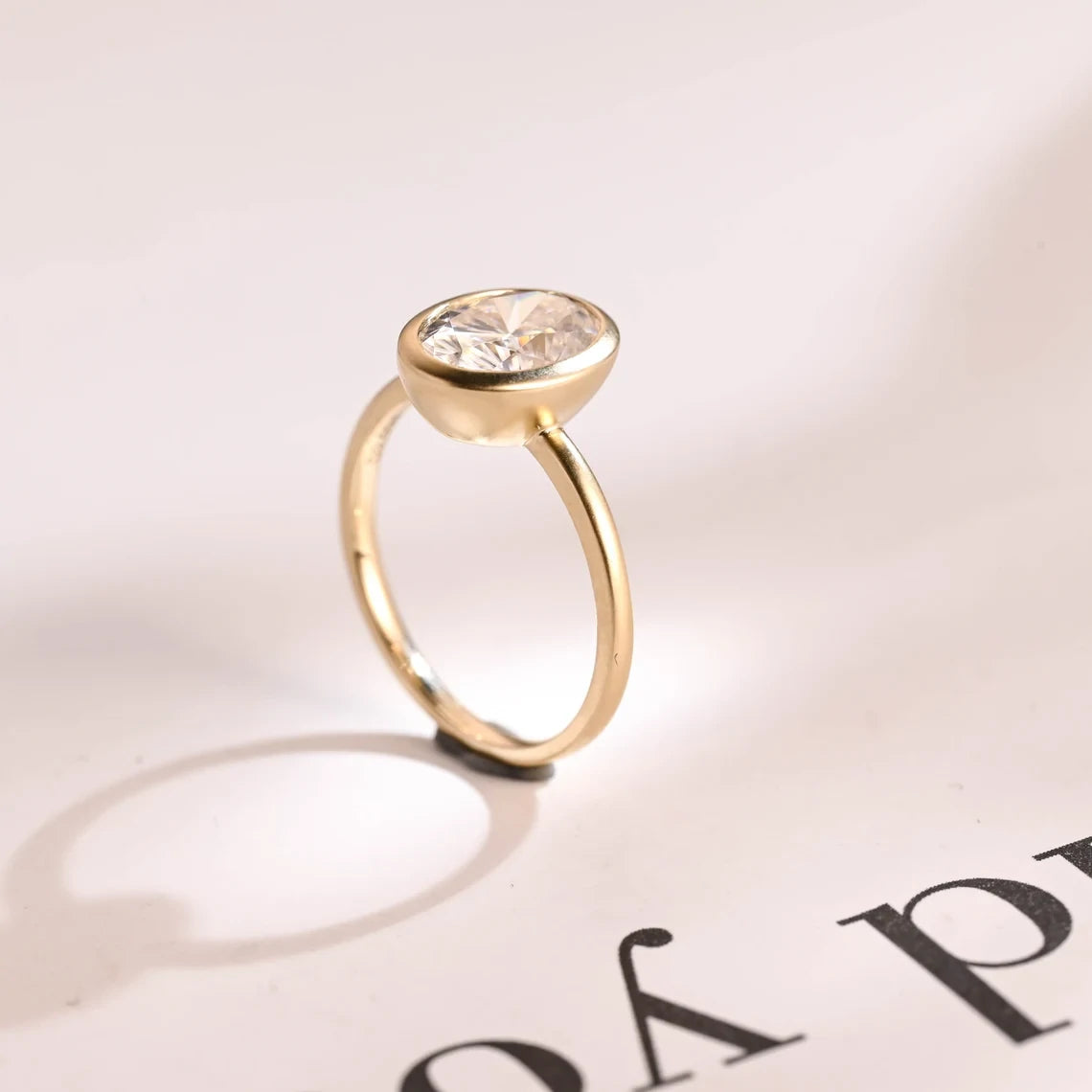 14k solitaire bezel ring