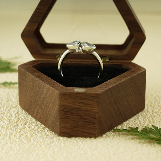 Bezel two heart cut diamond ring
