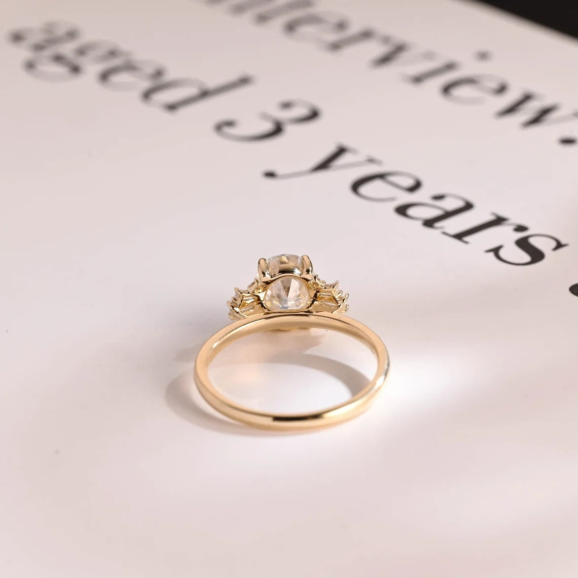 three stone moissanite ring