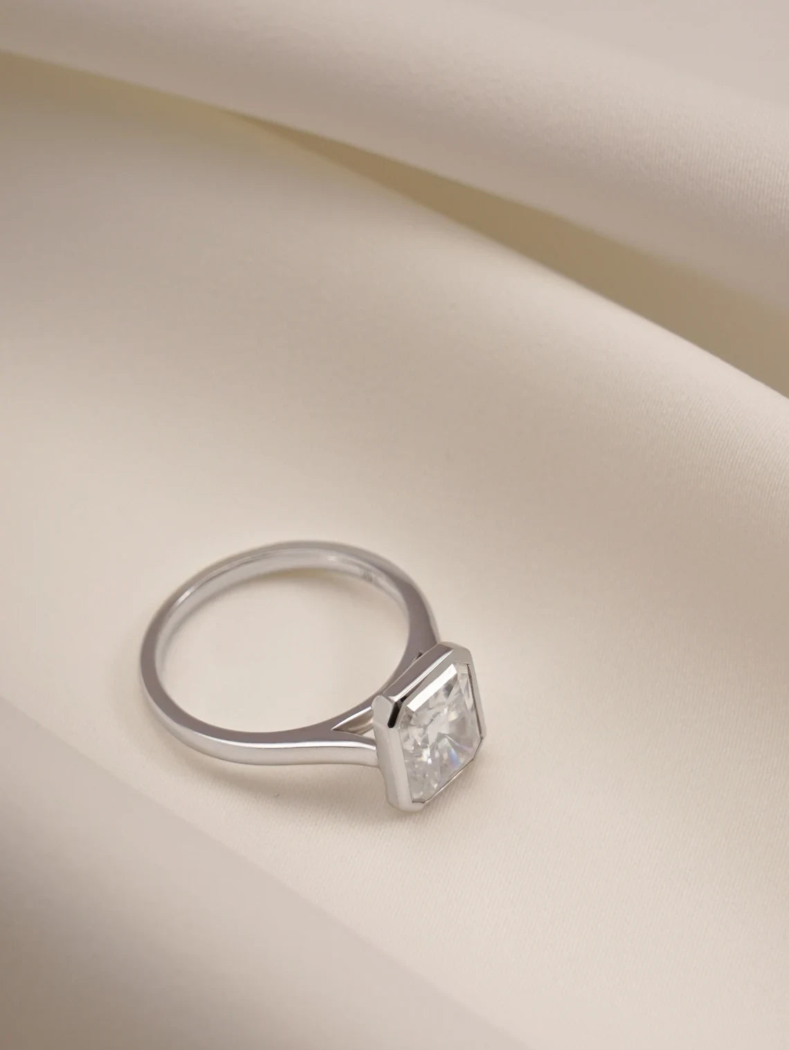 lab created diamond ring | clean bezel setting | radiant cut bridal ring