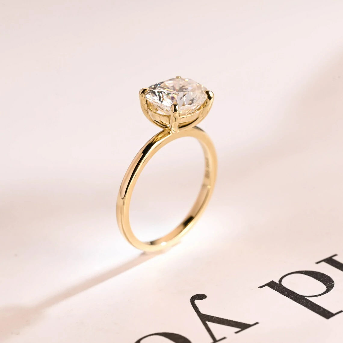 4 prong solitaire ring