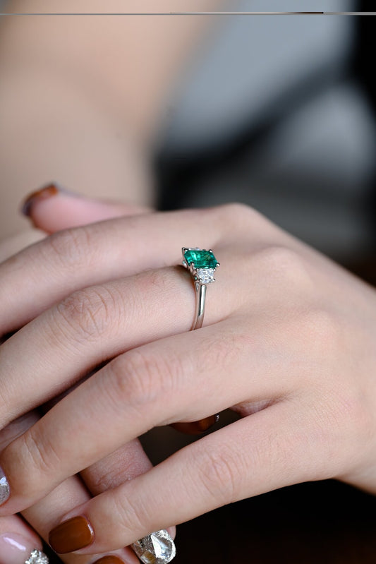 Three stone engagement ring