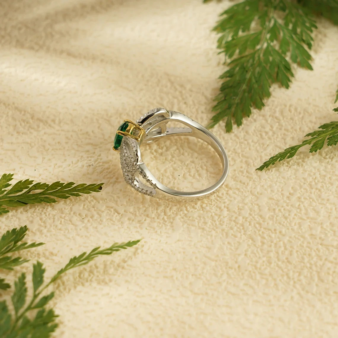 green gemstone ring