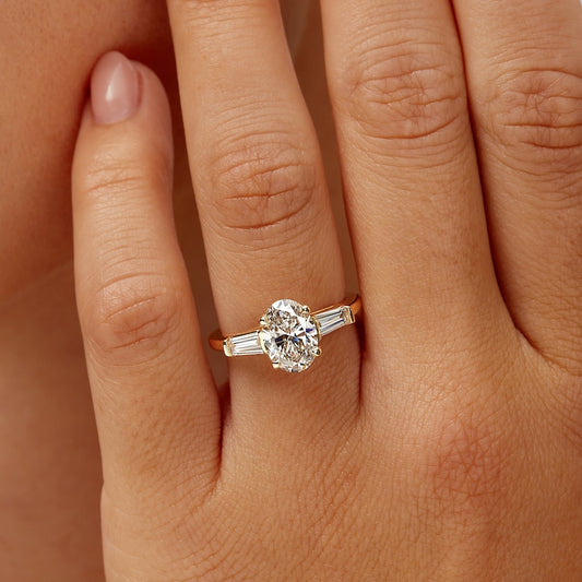 Three stone engagement ring