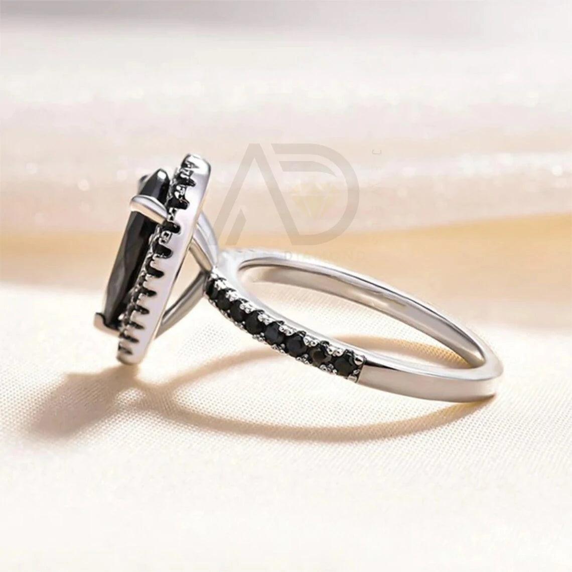pear diamond ring, pear moissanite ring, halo bridal ring, pear wedding ring, halo promise ring, vintage pear ring, elegant pear ring, unique pear ring, classic pear ring, custom pear ring, gold pear ring, platinum pear ring, silver pear ring, pear eternity ring, pear three stone ring, halo anniversary ring, luxury pear ring, dainty pear ring, simple pear ring