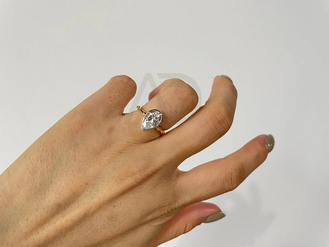 Pear Engagement, Elegant Ring, Bridal Jewelry, Teardrop Ring, Precious Stone, Unique Engagement, Custom Ring, Proposal Ring, Dainty Ring, Classic Jewelry, Handcrafted Ring, Designer Ring, Pear Shaped, Romantic Ring, Sparkling Gem, Wedding Ring, Bespoke Jewelry, Heartfelt Gift, Timeless Piece, Delicate Ring, Exquisite Design, Fine Jewelry, Gemstone Ring, Trendy Ring, Heirloom Quality, Modern Engagement, Artisan Ring, Forever Ring, Love Symbol, Stylish Jewelry