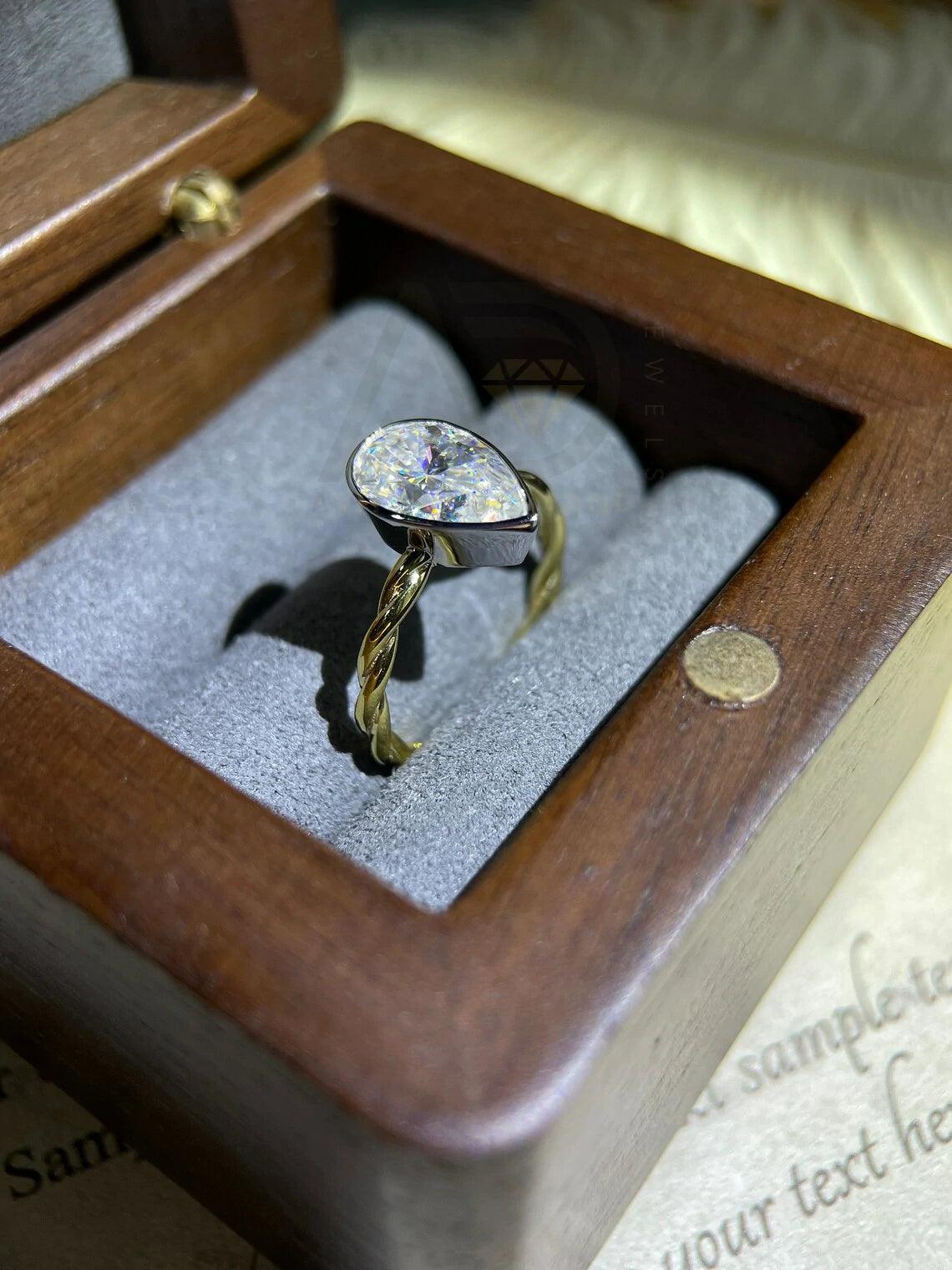 Pear Engagement, Elegant Ring, Bridal Jewelry, Teardrop Ring, Precious Stone, Unique Engagement, Custom Ring, Proposal Ring, Dainty Ring, Classic Jewelry, Handcrafted Ring, Designer Ring, Pear Shaped, Romantic Ring, Sparkling Gem, Wedding Ring, Bespoke Jewelry, Heartfelt Gift, Timeless Piece, Delicate Ring, Exquisite Design, Fine Jewelry, Gemstone Ring, Trendy Ring, Heirloom Quality, Modern Engagement, Artisan Ring, Forever Ring, Love Symbol, Stylish Jewelry