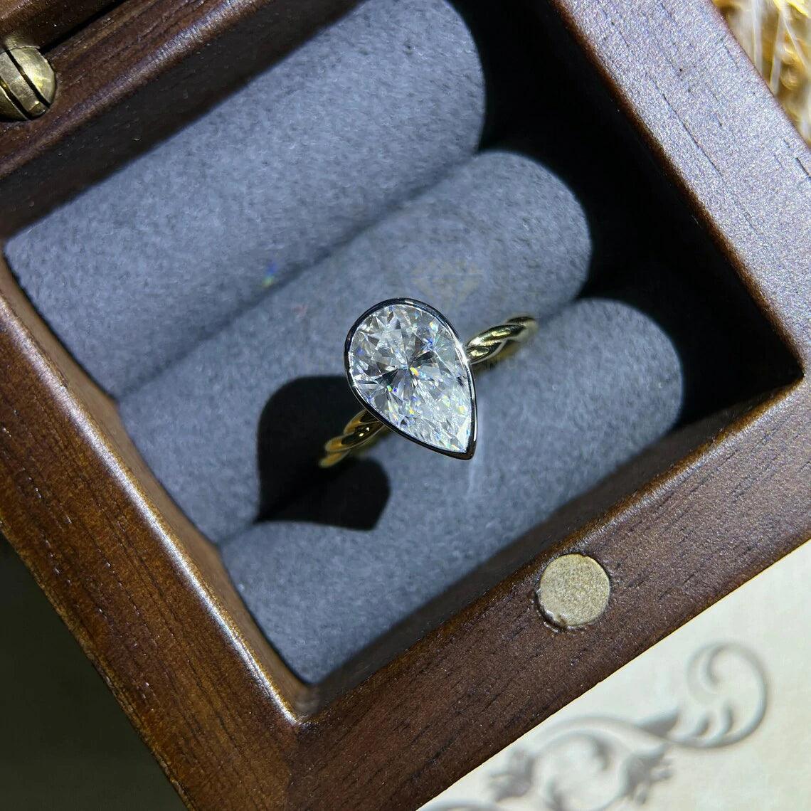 Pear Engagement, Elegant Ring, Bridal Jewelry, Teardrop Ring, Precious Stone, Unique Engagement, Custom Ring, Proposal Ring, Dainty Ring, Classic Jewelry, Handcrafted Ring, Designer Ring, Pear Shaped, Romantic Ring, Sparkling Gem, Wedding Ring, Bespoke Jewelry, Heartfelt Gift, Timeless Piece, Delicate Ring, Exquisite Design, Fine Jewelry, Gemstone Ring, Trendy Ring, Heirloom Quality, Modern Engagement, Artisan Ring, Forever Ring, Love Symbol, Stylish Jewelry