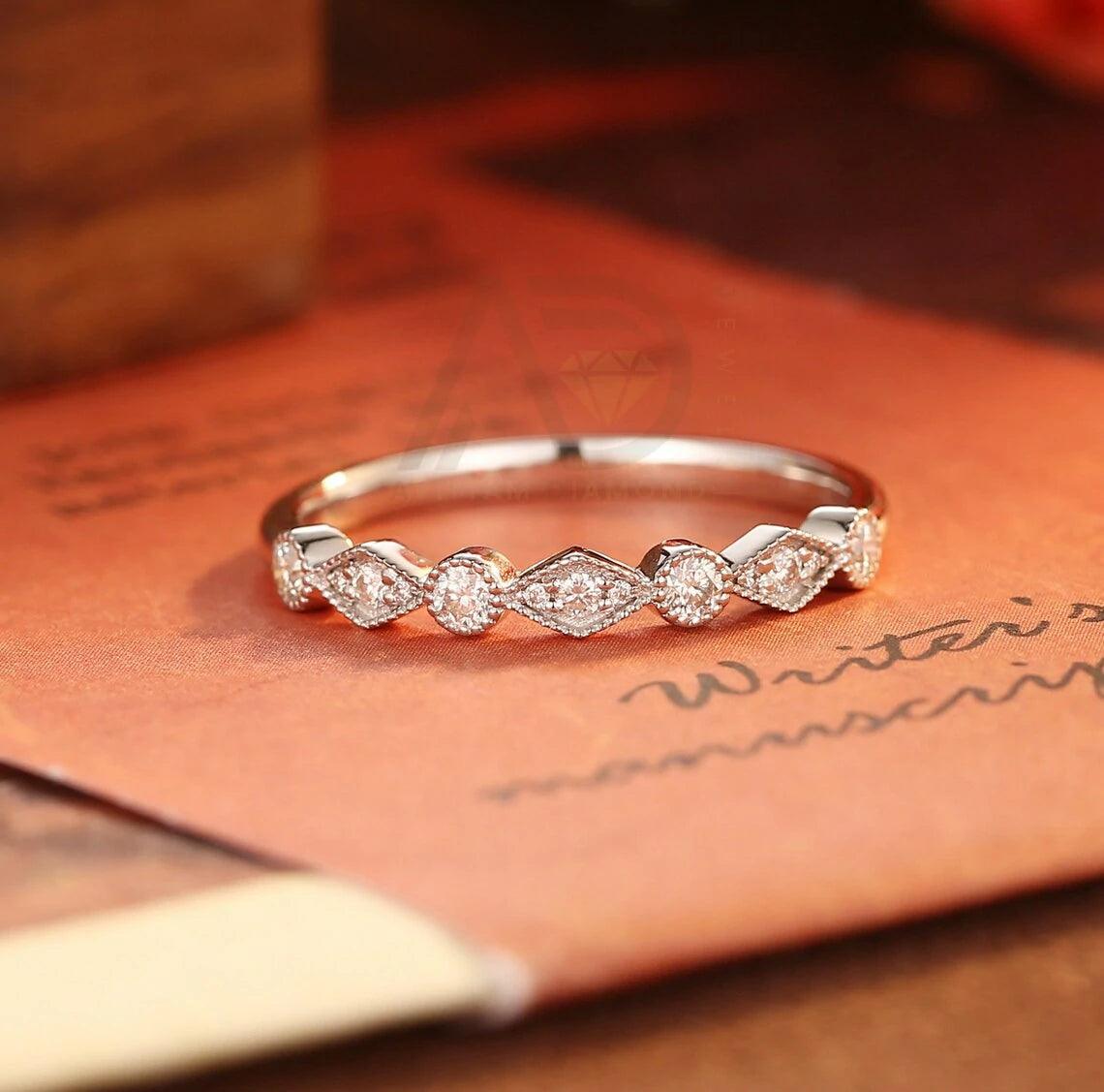 Here are additional SEO tags for your title: Round moissanite wedding band, 9K solid gold moissanite bridal band, 18K solid gold moissanite bridal band, Half-eternity moissanite matching band, Anniversary present, Customizable moissanite band, Half-eternity wedding band, Solid gold bridal band, Moissanite anniversary band, Handcrafted bridal jewelry