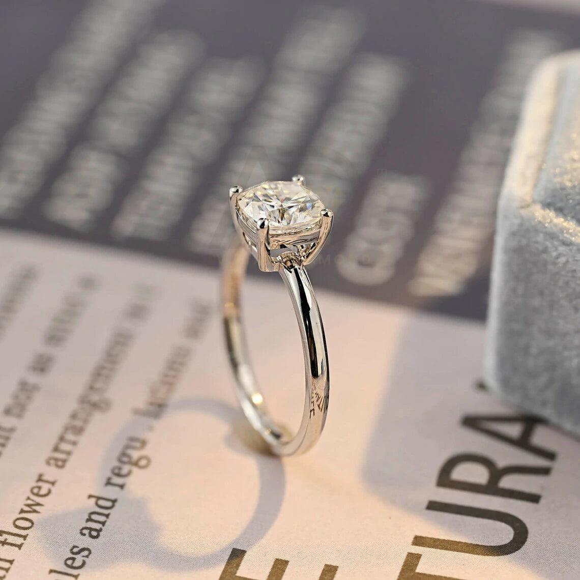 Solitaire cushion ring, Cushion diamond ring, Simple engagement ring, Moissanite cushion solitaire, Classic solitaire ring, Cushion cut bridal ring, Minimalist engagement ring, Moissanite cushion engagement, Elegant solitaire ring, Cushion promise ring, Solitaire moissanite bridal, Cushion cut wedding ring, Timeless solitaire ring, Solitaire diamond ring, Moissanite engagement solitaire, Cushion cut moissanite bridal, Solitaire anniversary ring, Cushion solitaire diamond