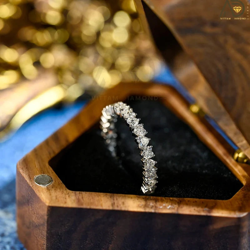 Discover our stunning Heart Cut Full Eternity Wedding Band, perfect for proposals and as a matching band. This beautiful design symbolizes everlasting love and makes a heartfelt Christmas gift.