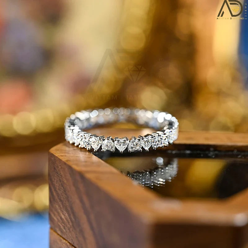 Discover our stunning Heart Cut Full Eternity Wedding Band, perfect for proposals and as a matching band. This beautiful design symbolizes everlasting love and makes a heartfelt Christmas gift.