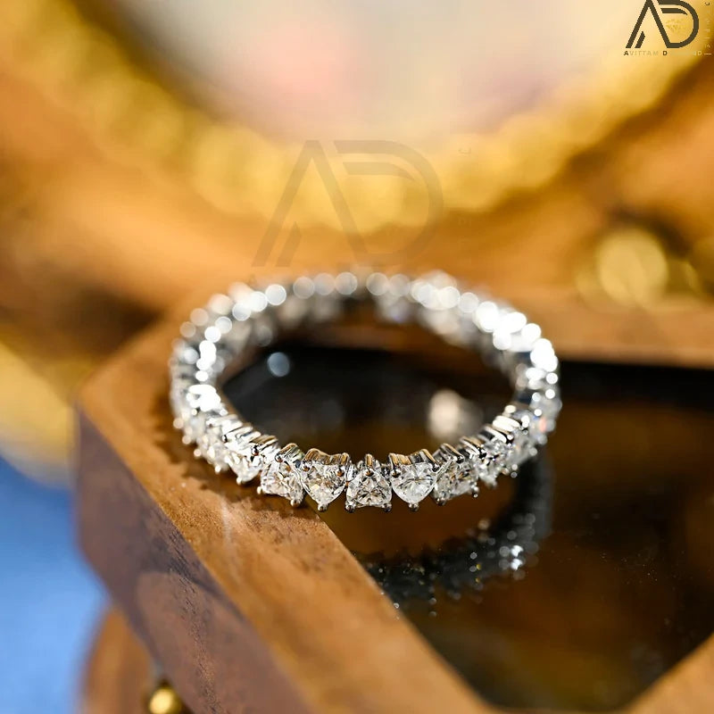 Discover our stunning Heart Cut Full Eternity Wedding Band, perfect for proposals and as a matching band. This beautiful design symbolizes everlasting love and makes a heartfelt Christmas gift.
