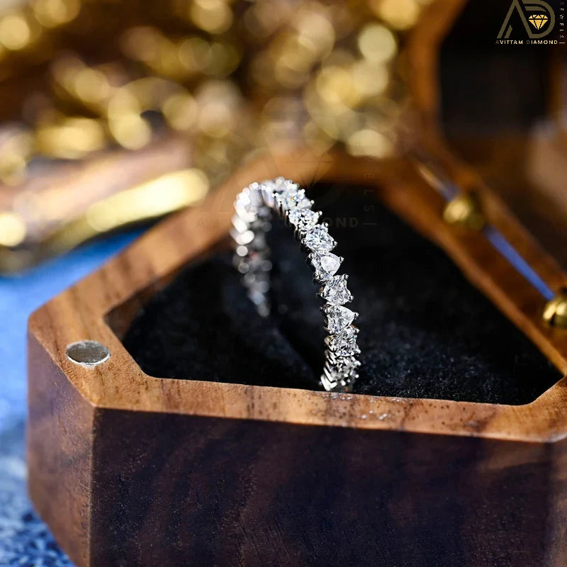 Discover our stunning Heart Cut Full Eternity Wedding Band, perfect for proposals and as a matching band. This beautiful design symbolizes everlasting love and makes a heartfelt Christmas gift.