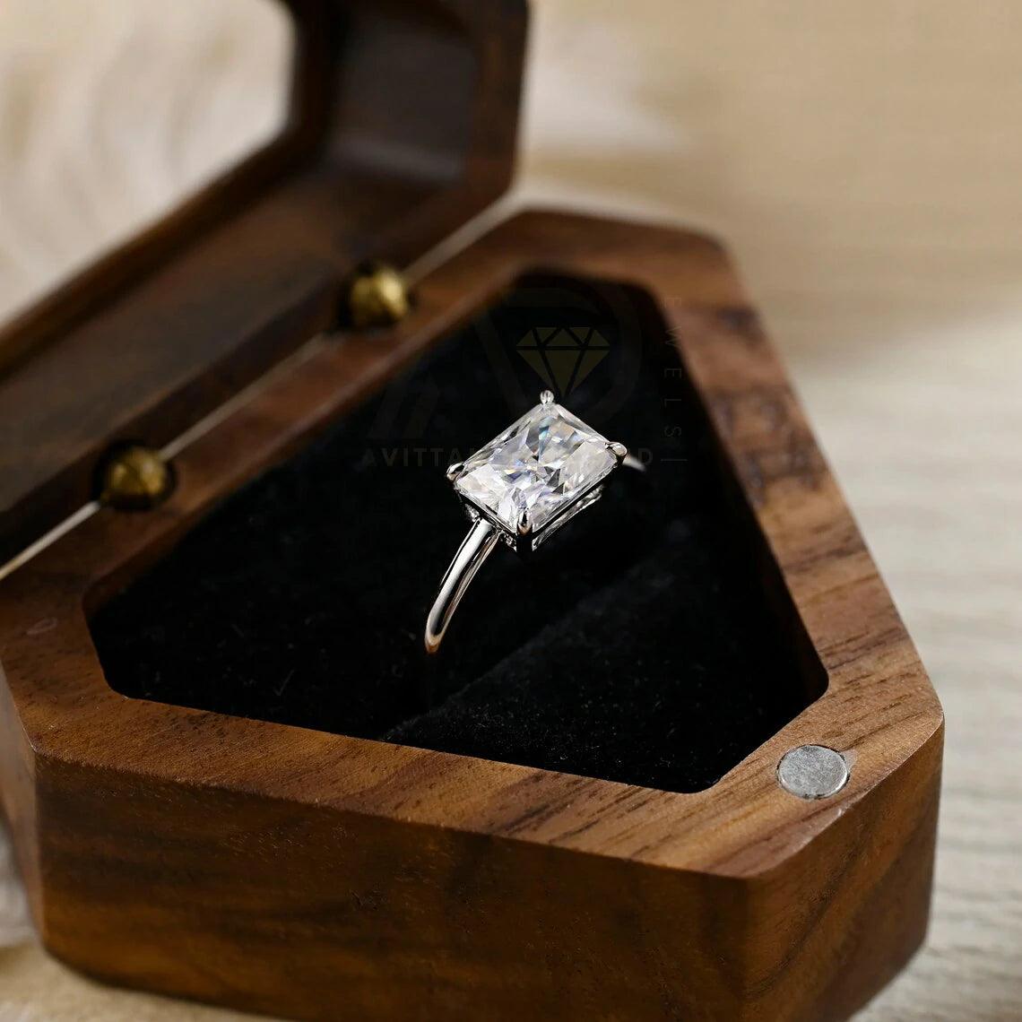Discover elegance with our West to East Radiant Cut Solitaire Moissanite Engagement Ring. Crafted with a 3.00-carat radiant-cut moissanite diamond, Perfect for weddings or anniversaries. Shop now!