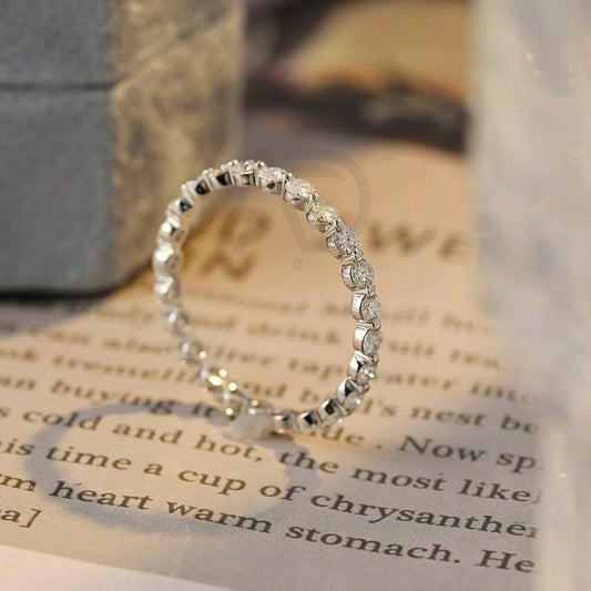 Here are the SEO tags separated by commas for your title: Round cut moissanite wedding band, 10K solid gold moissanite bridal band, 14K solid gold moissanite bridal band, 18K solid gold moissanite bridal band, Full-eternity moissanite matching band, Anniversary gift