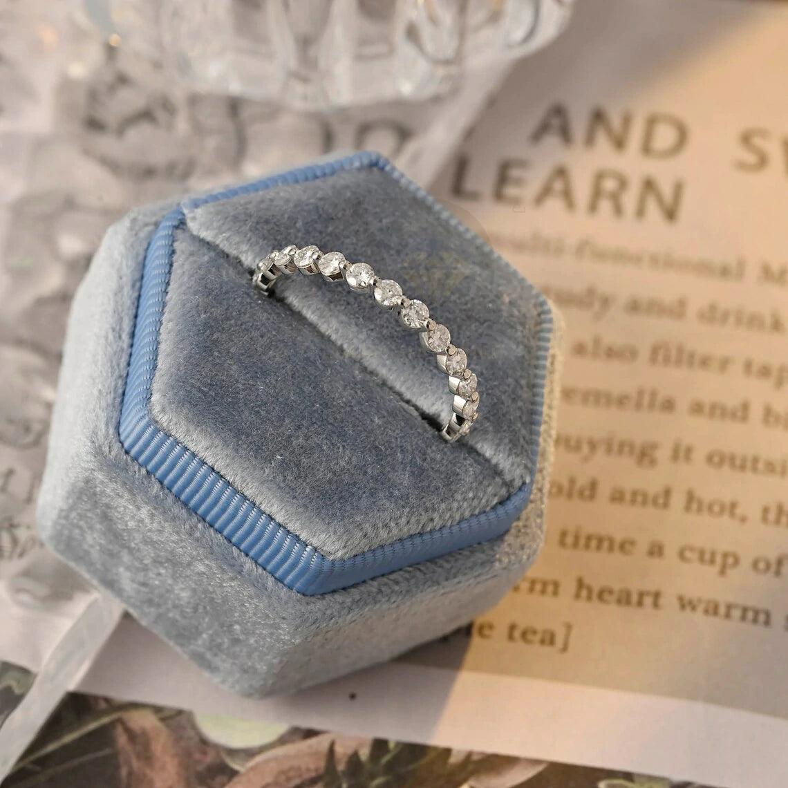 Certainly! Here are more SEO tags for your title: Round moissanite band, Solid gold wedding band, Moissanite eternity band, Bridal jewelry, Anniversary ring, Eternity wedding band, Gold bridal band, Matching moissanite band, Customizable wedding band, Sparkling bridal jewelry
