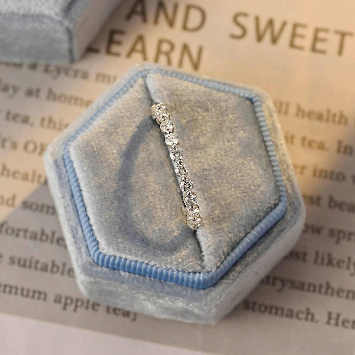 Certainly! Here are more SEO tags for your title: Round moissanite band, Solid gold wedding band, Moissanite eternity band, Bridal jewelry, Anniversary ring, Eternity wedding band, Gold bridal band, Matching moissanite band, Customizable wedding band, Sparkling bridal jewelry