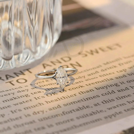 Marquise Cut Ring, Solid Gold Ring, Engagement Ring, Bridal Jewelry, Wedding Band, Anniversary Gift, Elegant Ring, Moissanite Ring, Diamond Ring, Vintage Style, Custom Jewelry, Handcrafted Ring, Unique Design, Fine Jewelry, Sparkling Ring, Promise Ring, Luxury Ring, Delicate Jewelry, Gold Jewelry, Romantic Gift, Proposal Ring, Designer Ring, Classic Ring, High-Quality Ring, Love Symbol