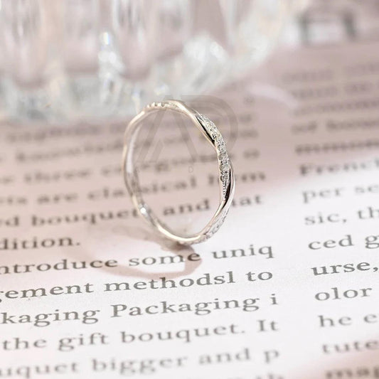 Here are more SEO tags for your title: Round cut twisted moissanite band, Vintage wedding band for women, Cross wedding ring, Unique bridal matching band, Solid gold wedding band, Handcrafted bridal jewelry, Twisted moissanite band, Vintage-inspired wedding band, Customizable bridal band, Gold cross wedding ring