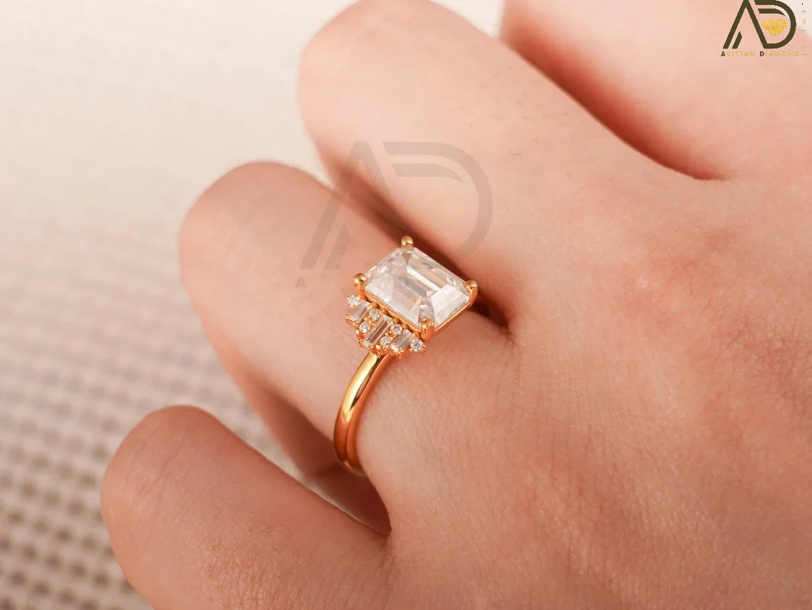 Celebrate love with this beautiful 10K/14K/18K Solid Gold Emerald Cut Moissanite Engagement Ring. Its dainty cluster design is perfect for engagements, anniversaries, or as a thoughtful birthday gift for her.