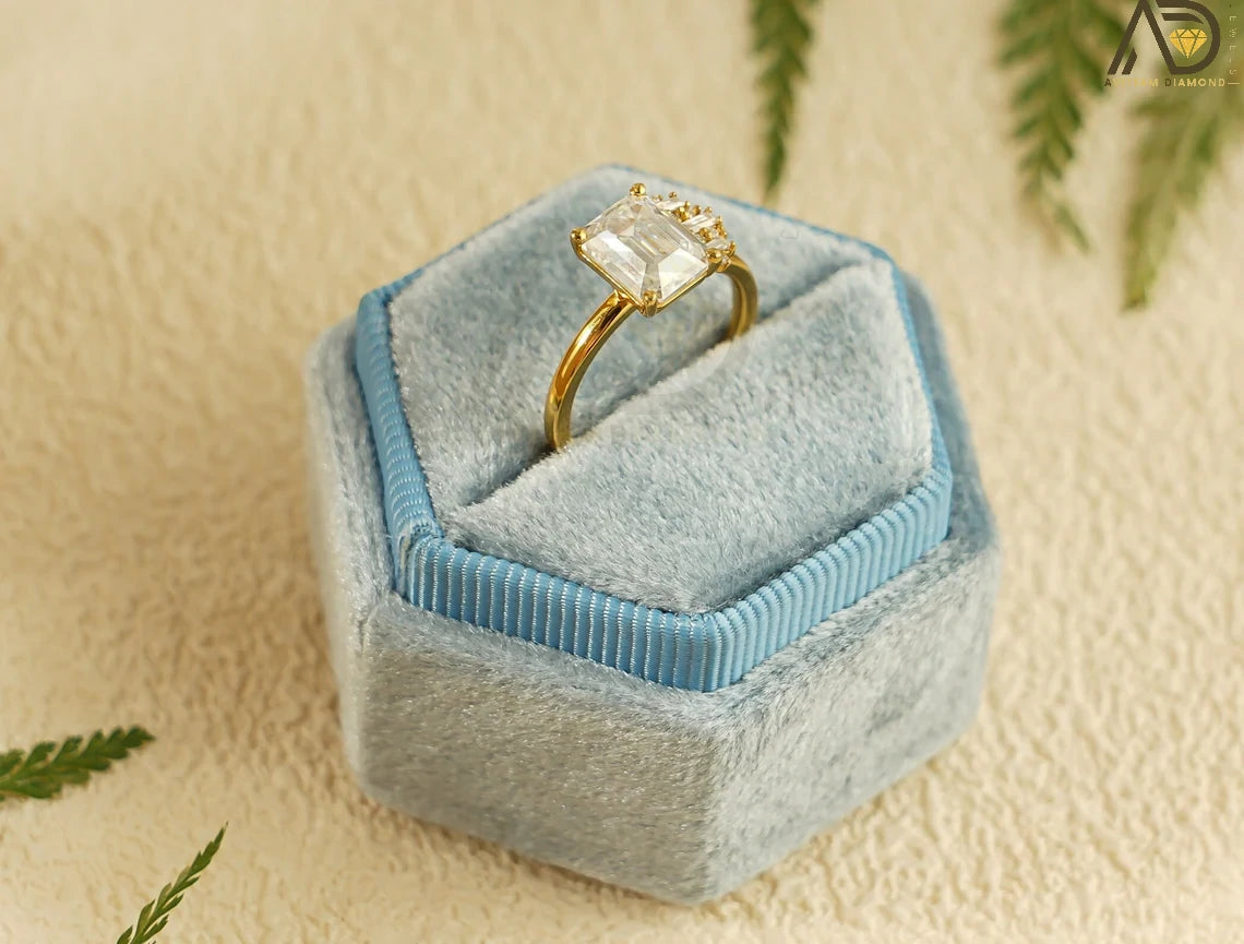 Celebrate love with this beautiful 10K/14K/18K Solid Gold Emerald Cut Moissanite Engagement Ring. Its dainty cluster design is perfect for engagements, anniversaries, or as a thoughtful birthday gift for her.