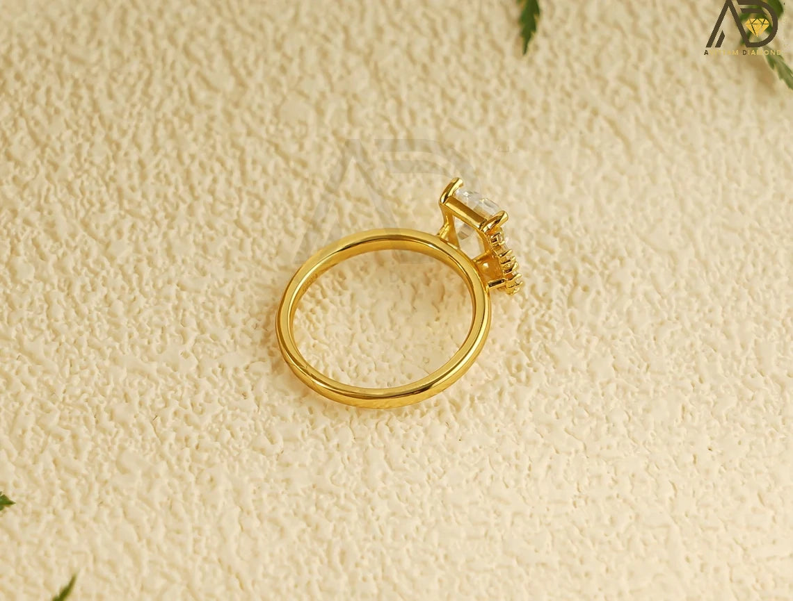 Celebrate love with this beautiful 10K/14K/18K Solid Gold Emerald Cut Moissanite Engagement Ring. Its dainty cluster design is perfect for engagements, anniversaries, or as a thoughtful birthday gift for her.
