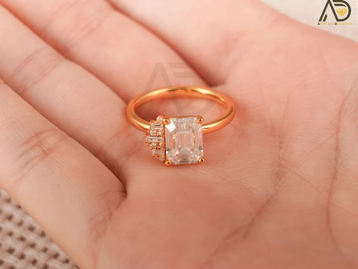 Celebrate love with this beautiful 10K/14K/18K Solid Gold Emerald Cut Moissanite Engagement Ring. Its dainty cluster design is perfect for engagements, anniversaries, or as a thoughtful birthday gift for her.