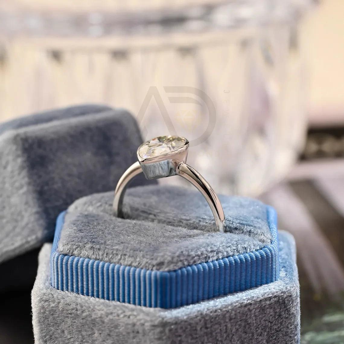 halo pear ring, pear engagement ring, pear halo ring, halo diamond ring, halo moissanite ring, pear cut ring, pear diamond ring, pear moissanite ring, halo bridal ring, pear wedding ring, halo promise ring, vintage pear ring, elegant pear ring, unique pear ring, classic pear ring, custom pear ring, gold pear ring, platinum pear ring, silver pear ring, pear eternity ring,