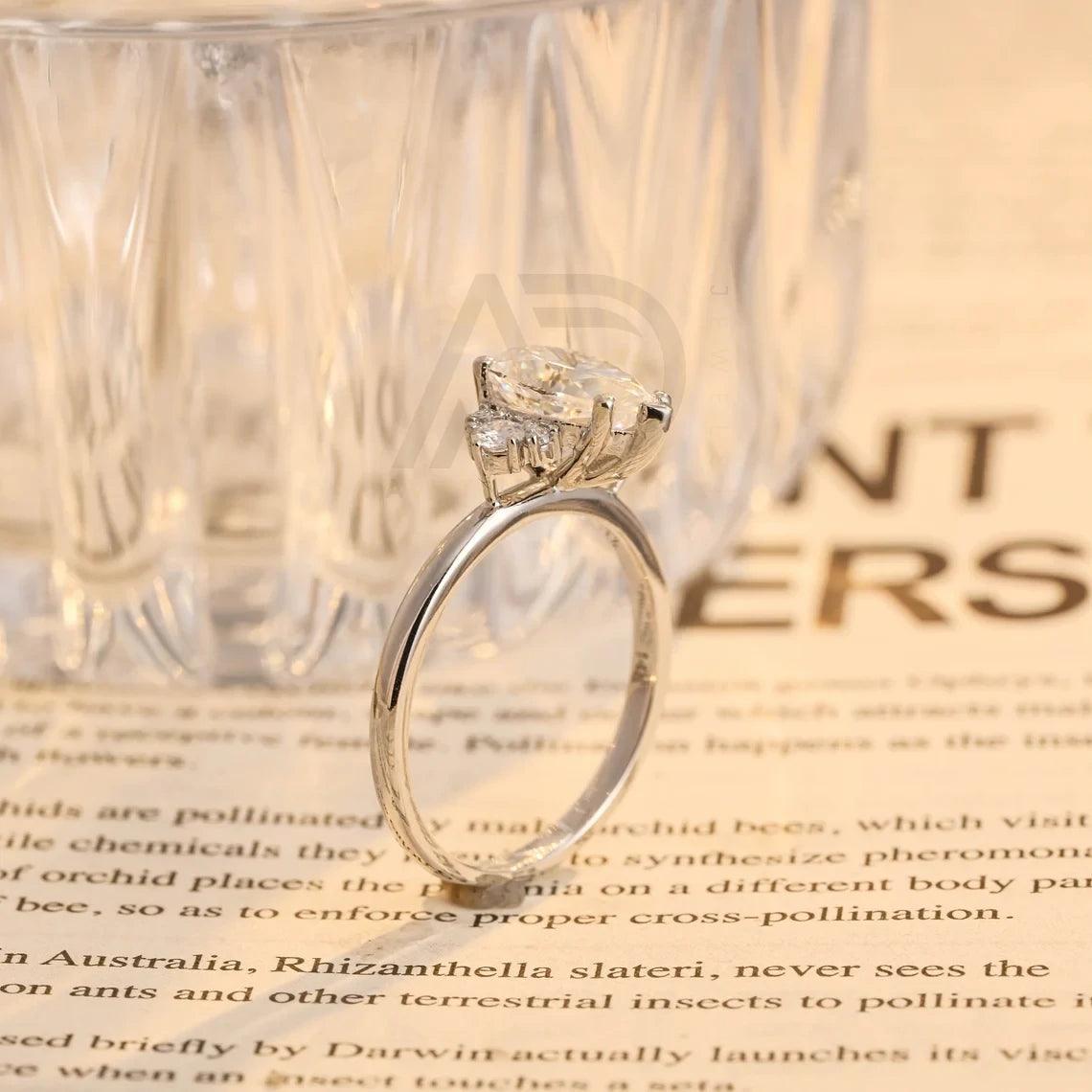 Pear Moissanite Engagement Ring, Teardrop Shaped Moissanite Ring, Round Accent Stone Ring, Solid Gold Promise Ring, Anniversary Gift for Women, Customizable Fine Jewelry, Unique Wedding Band, Luxurious Symbol of Love, Timeless Elegance, Romantic Anniversary Jewelry