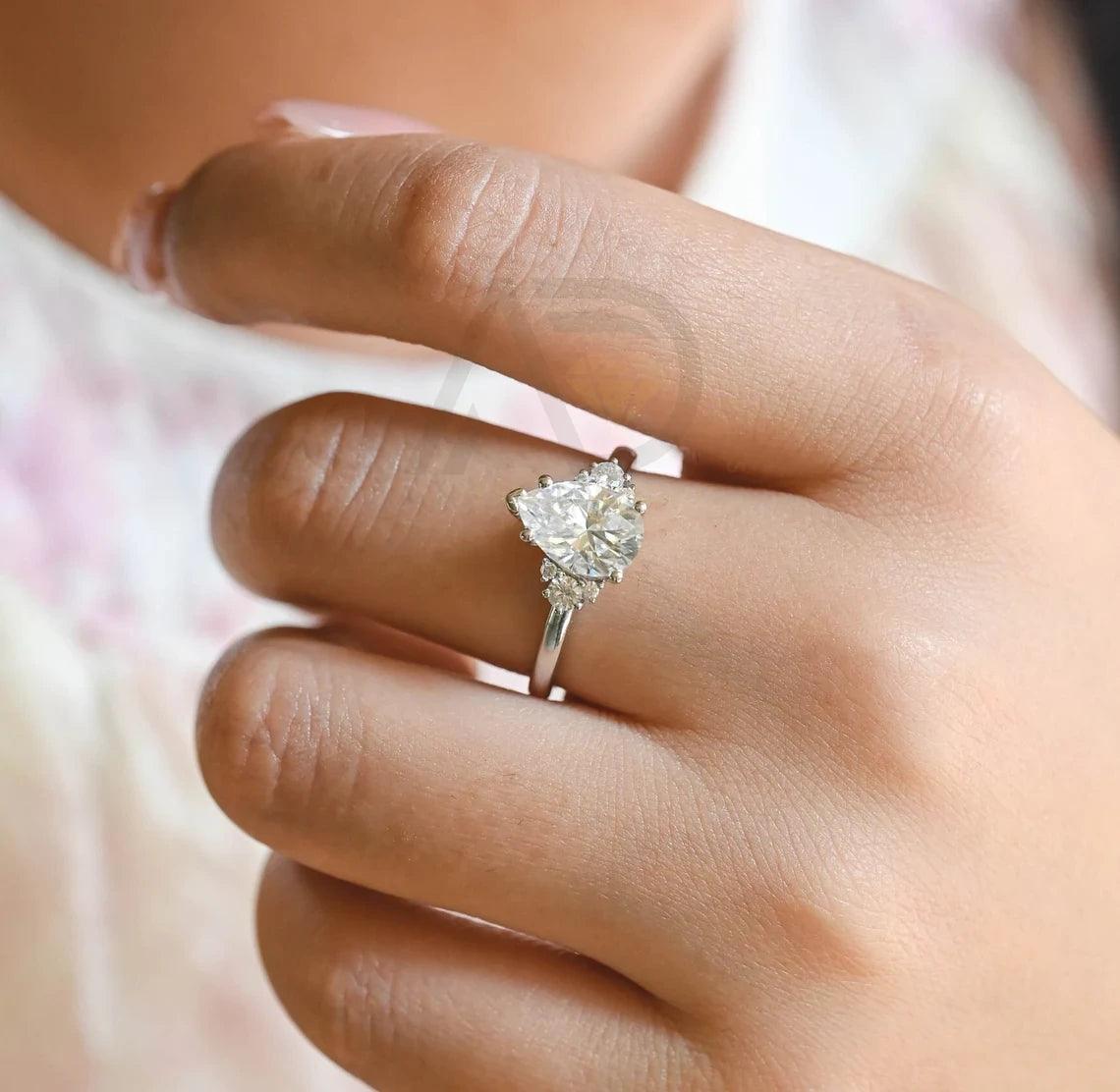 Pear Moissanite Engagement Ring, Teardrop Shaped Moissanite Ring, Round Accent Stone Ring, Solid Gold Promise Ring, Anniversary Gift for Women, Customizable Fine Jewelry, Unique Wedding Band, Luxurious Symbol of Love, Timeless Elegance, Romantic Anniversary Jewelry
