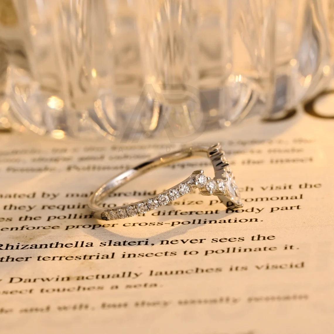 Explore our elegant half eternity moissanite wedding band crafted in solid gold. Featuring marquise and round cut designs, perfect for bridal matching. Ideal for weddings and engagements.