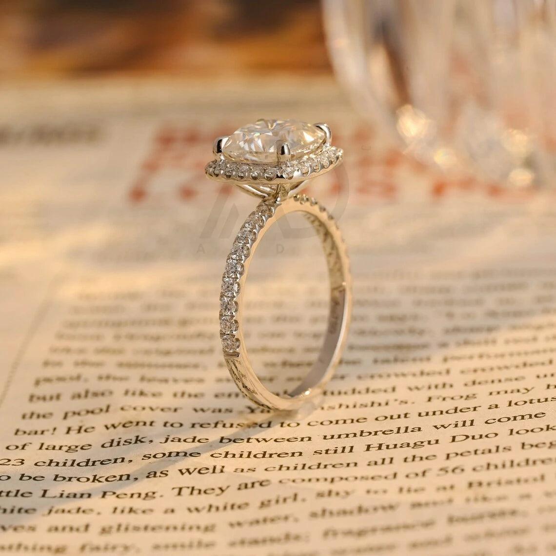Cushion diamond ring, Engagement halo ring, Moissanite cushion ring, Halo bridal ring, Cushion cut wedding, Moissanite engagement ring, Halo cushion diamond, Vintage halo ring, Cushion cut promise, Elegant halo ring, Moissanite cushion halo, Halo anniversary ring, Bridal halo ring, Cushion solitaire ring, Timeless halo ring, Halo moissanite bridal, Cushion cut moissanite halo, Classic halo ring