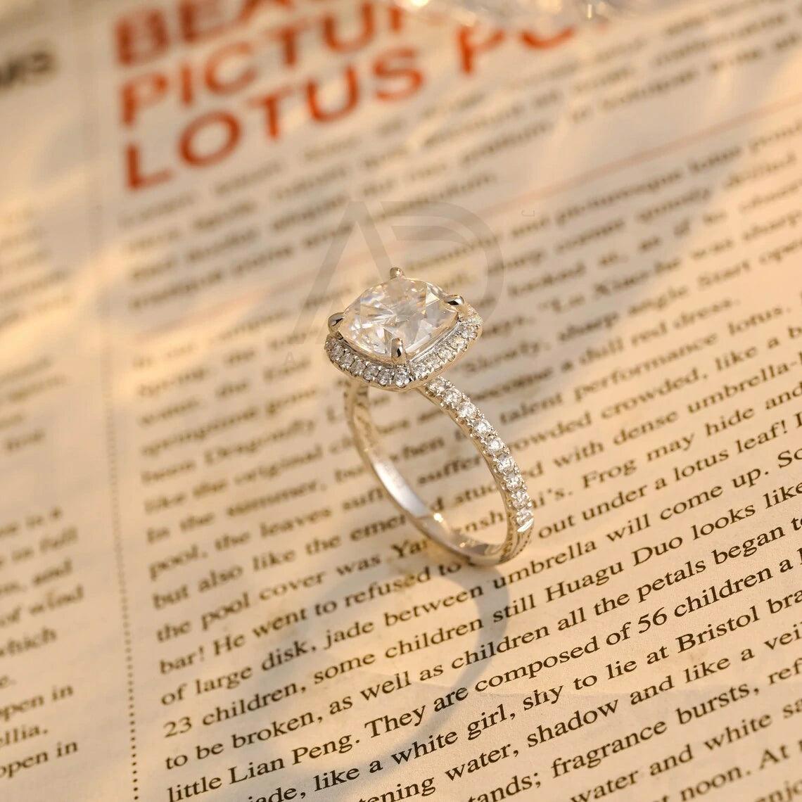 Cushion diamond ring, Engagement halo ring, Moissanite cushion ring, Halo bridal ring, Cushion cut wedding, Moissanite engagement ring, Halo cushion diamond, Vintage halo ring, Cushion cut promise, Elegant halo ring, Moissanite cushion halo, Halo anniversary ring, Bridal halo ring, Cushion solitaire ring, Timeless halo ring, Halo moissanite bridal, Cushion cut moissanite halo, Classic halo ring