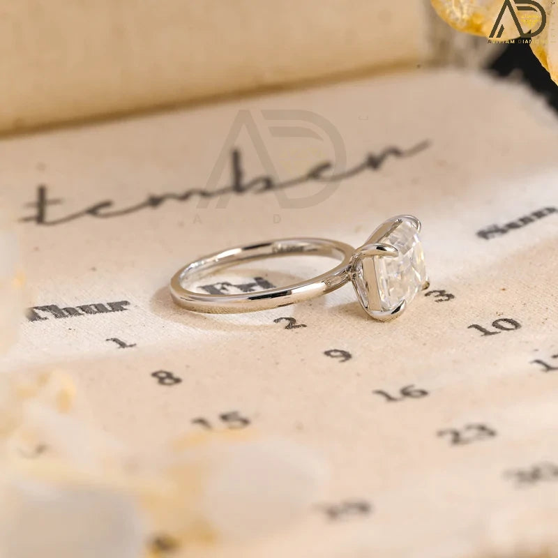 Emerald Cut East West Engagement Ring