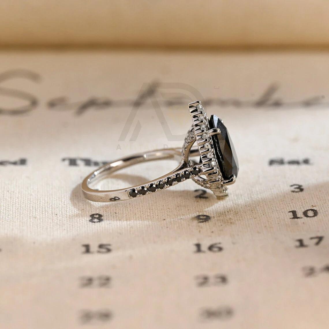 halo pear ring, pear engagement ring, pear halo ring, halo diamond ring, halo moissanite ring, pear cut ring, pear diamond ring, pear moissanite ring, halo bridal ring, pear wedding ring, halo promise ring, vintage pear ring, elegant pear ring, unique pear ring, classic pear ring, custom pear ring, gold pear ring, platinum pear ring, silver pear ring, pear eternity ring, pear three stone ring, halo anniversary ring, luxury pear ring, dainty pear ring, simple pear ring