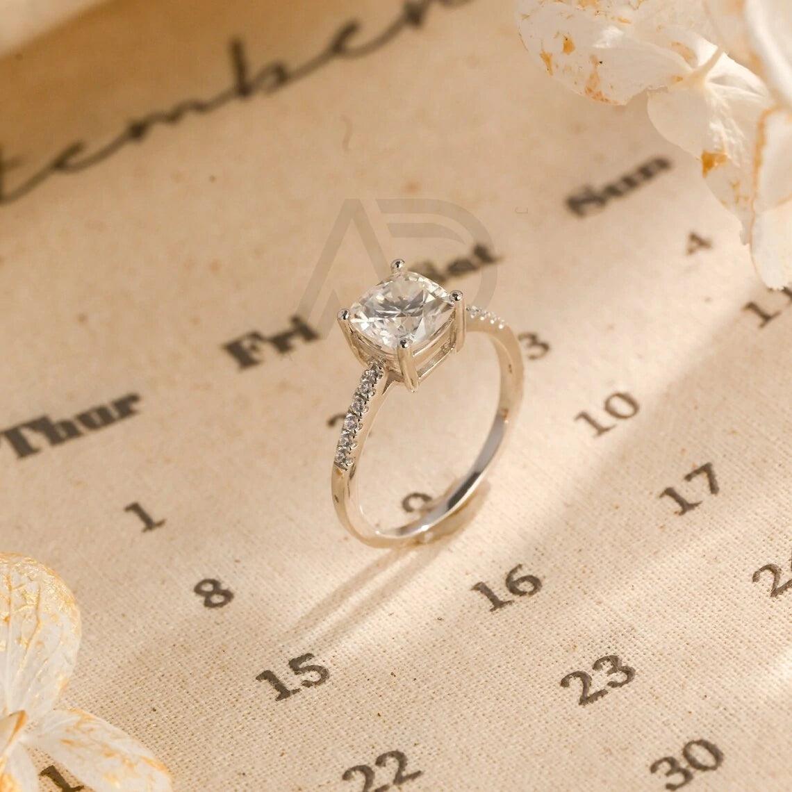 Cushion cut moissanite, Eternity engagement ring, Moissanite cushion ring, Cushion cut engagement, Eternity cushion ring, Moissanite wedding ring, Cushion diamond ring, Engagement eternity ring, Cushion cut bridal, Moissanite eternity band, Cushion halo ring, Moissanite engagement, Eternity moissanite band, Cushion cut promise ring, Vintage cushion ring, Moissanite cushion bridal, Cushion cut anniversary, Eternity diamond ring