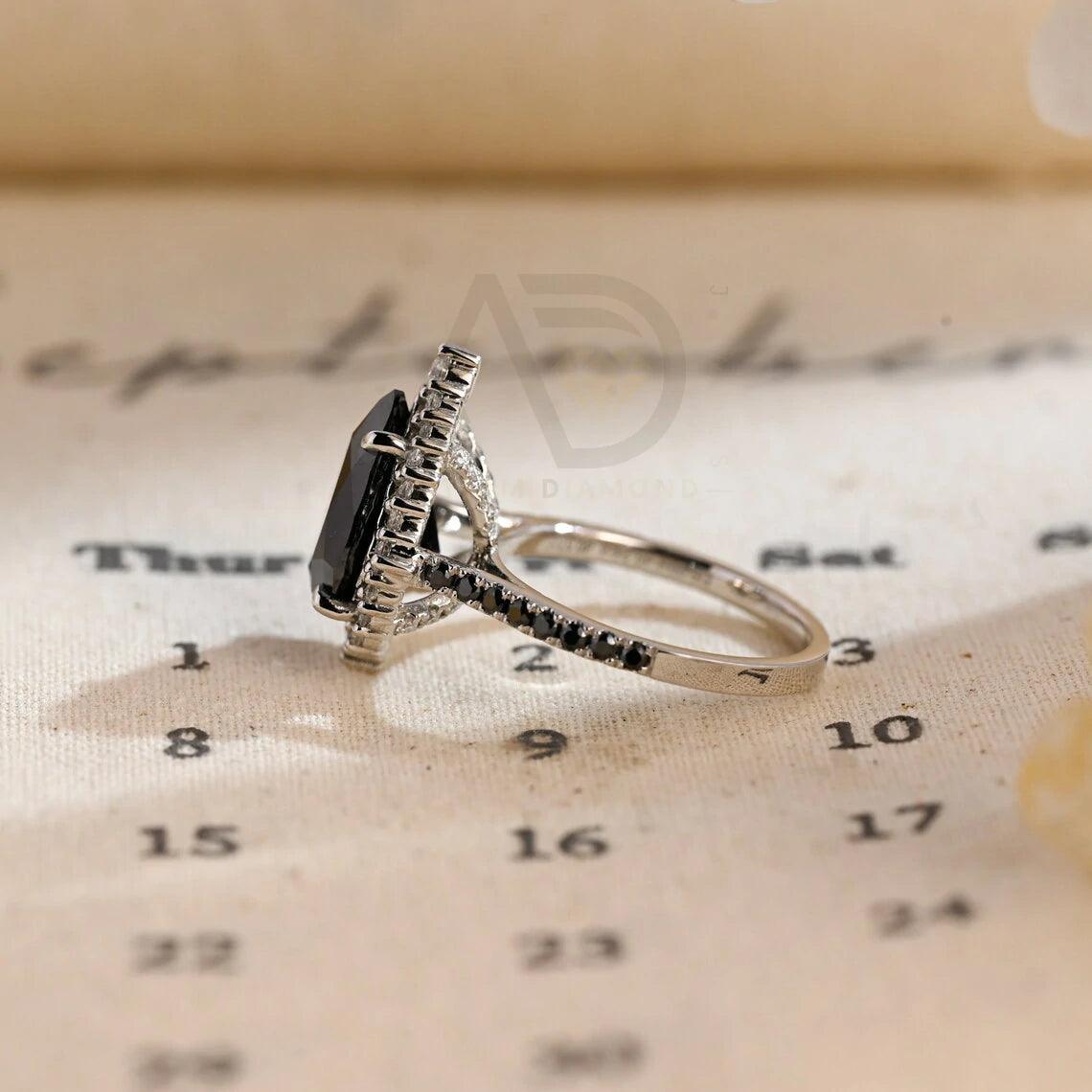 halo pear ring, pear engagement ring, pear halo ring, halo diamond ring, halo moissanite ring, pear cut ring, pear diamond ring, pear moissanite ring, halo bridal ring, pear wedding ring, halo promise ring, vintage pear ring, elegant pear ring, unique pear ring, classic pear ring, custom pear ring, gold pear ring, platinum pear ring, silver pear ring, pear eternity ring, pear three stone ring, halo anniversary ring, luxury pear ring, dainty pear ring, simple pear ring