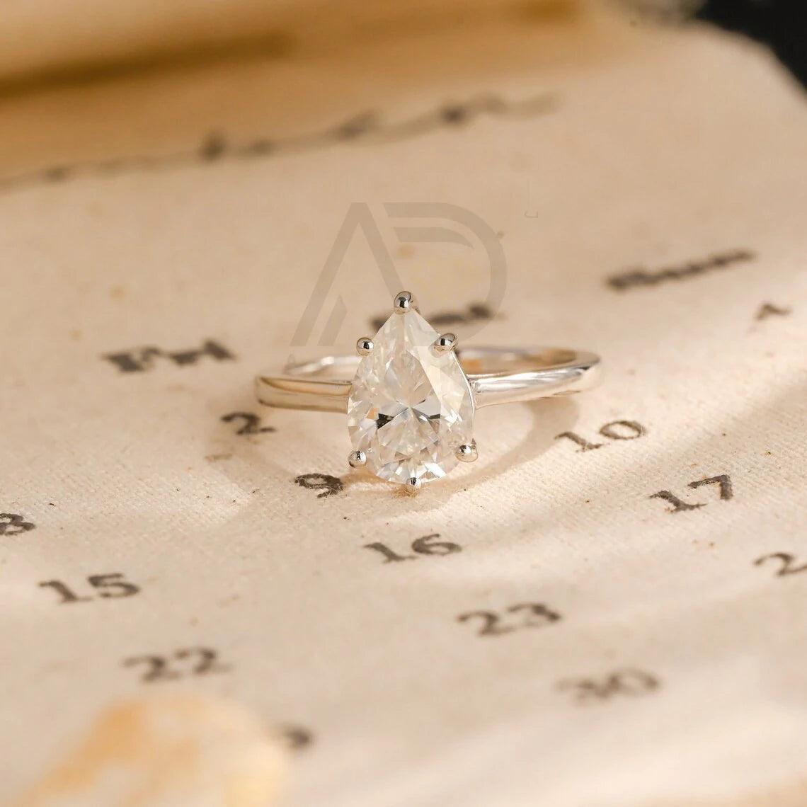 Solitaire pear cut moissanite engagement ring, Solid gold minimalist style promise ring wedding ring, Anniversary gift for her, Pear cut moissanite ring, Minimalist wedding band, Anniversary jewelry, Bridal ring set.