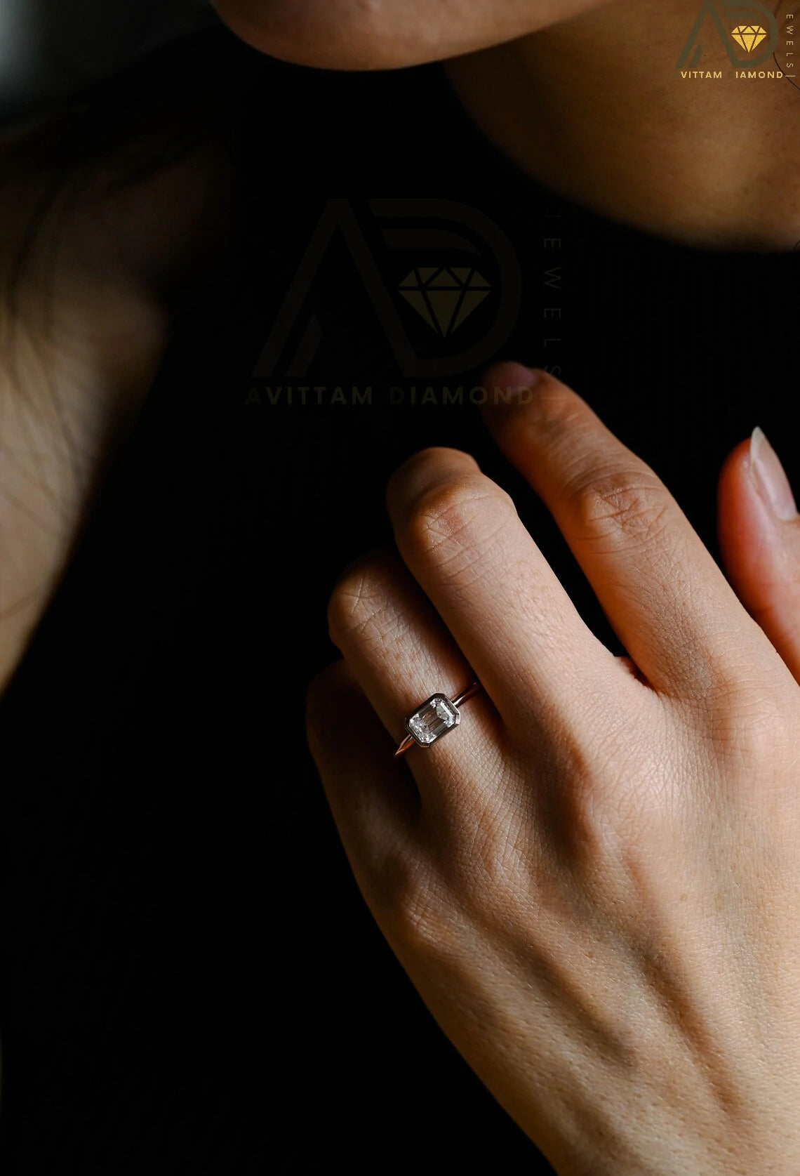 Celebrate your love with this solid gold East to West emerald cut moissanite engagement ring. Ideal for proposals, promises, anniversaries, or Christmas gifts. A stunning, timeless design for her.