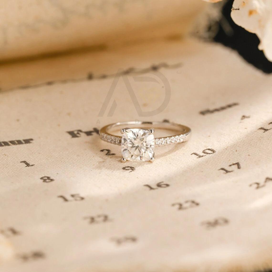 Cushion cut moissanite, Eternity engagement ring, Moissanite cushion ring, Cushion cut engagement, Eternity cushion ring, Moissanite wedding ring, Cushion diamond ring, Engagement eternity ring, Cushion cut bridal, Moissanite eternity band, Cushion halo ring, Moissanite engagement, Eternity moissanite band, Cushion cut promise ring, Vintage cushion ring, Moissanite cushion bridal, Cushion cut anniversary, Eternity diamond ring