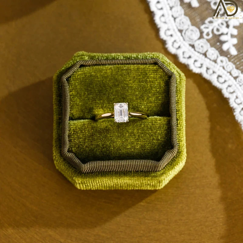 Discover our vintage style Emerald Cut Moissanite Solitaire Ring, designed to evoke timeless elegance. Perfect for engagements or as a unique gift for her.