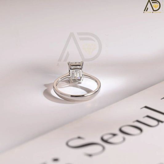 Solid gold emerald cut engagement ring