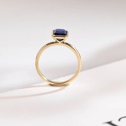 Blue emerald cut cz diamond ring