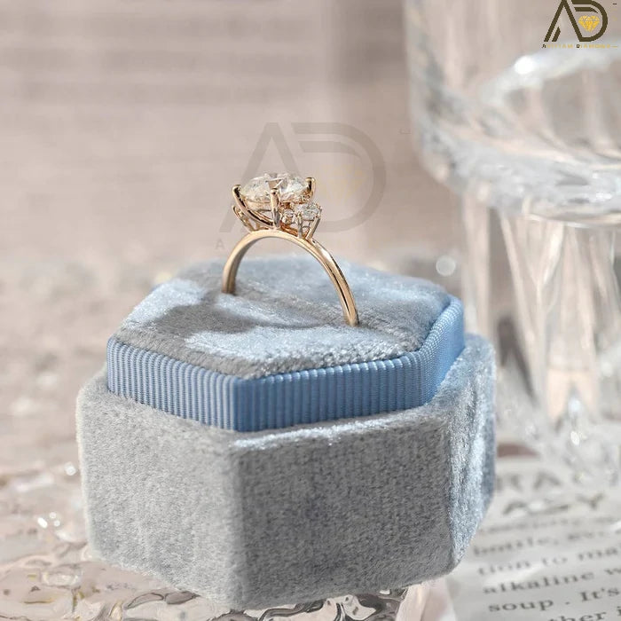 Discover our Three Stone Round Cut Moissanite Ring, a stunning choice for her engagement. Its elegant design and brilliance make it an unforgettable symbol of love.