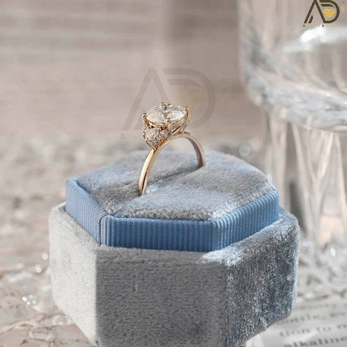 Discover our Three Stone Round Cut Moissanite Ring, a stunning choice for her engagement. Its elegant design and brilliance make it an unforgettable symbol of love.
