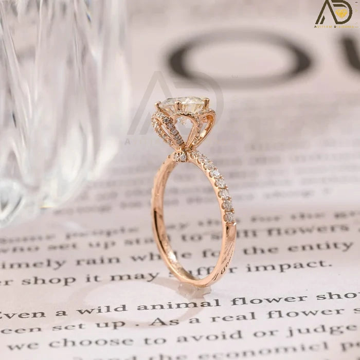 Discover elegance with our Solitaire Round Cut Moissanite Engagement Ring, featuring a unique Flower Halo and Hidden Halo setting. Perfect for a timeless proposal.