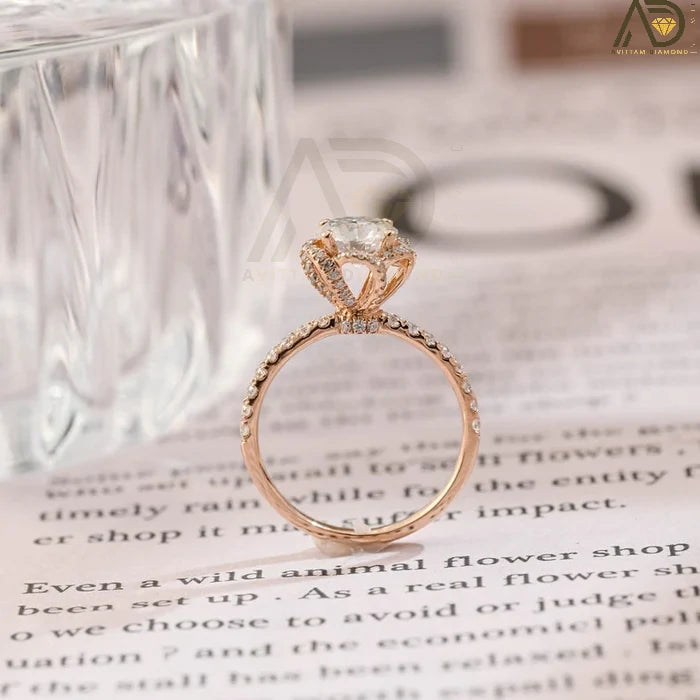 Discover elegance with our Solitaire Round Cut Moissanite Engagement Ring, featuring a unique Flower Halo and Hidden Halo setting. Perfect for a timeless proposal.
