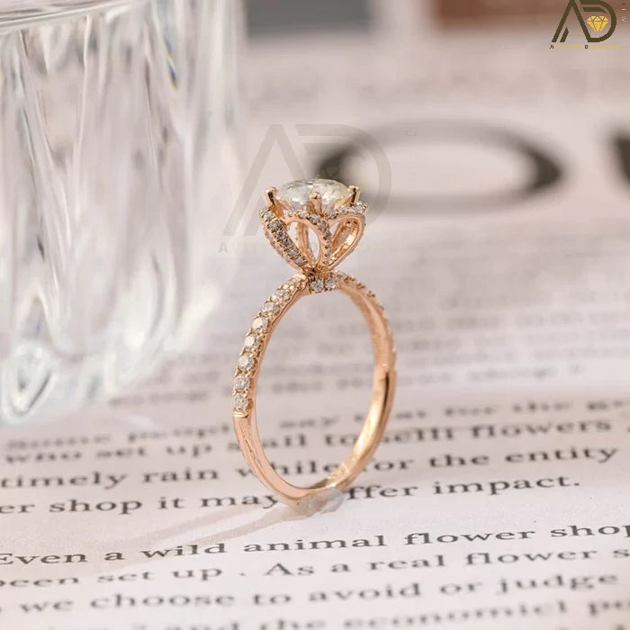 Discover elegance with our Solitaire Round Cut Moissanite Engagement Ring, featuring a unique Flower Halo and Hidden Halo setting. Perfect for a timeless proposal.