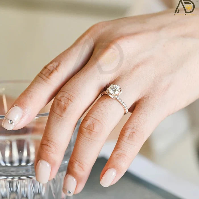 Discover elegance with our Solitaire Round Cut Moissanite Engagement Ring, featuring a unique Flower Halo and Hidden Halo setting. Perfect for a timeless proposal.